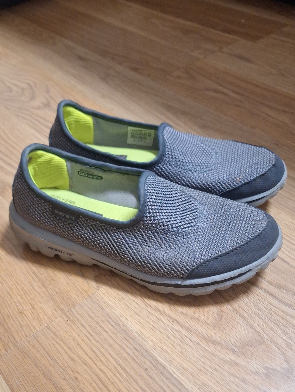 Skechers GoWalk  Women’s Slip-On Casual Sneakers in Gray with Neon Yellow Lining